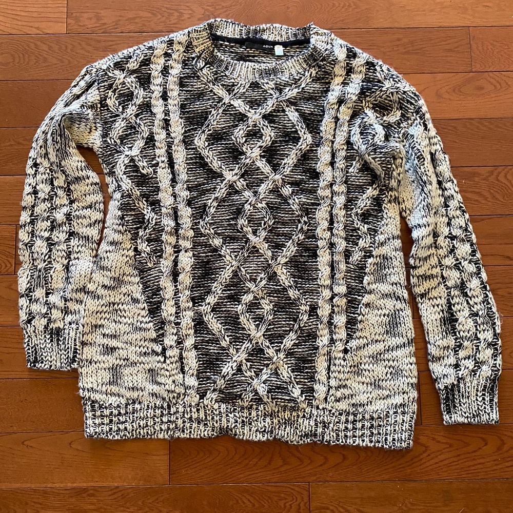Black & white Women’s sweater by Aqua.